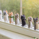 Kreative handgemachte Kätzchenpuppe aus Wollfilz
