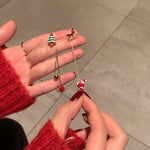 Asymmetrische Weihnachtsmann Ohrringe